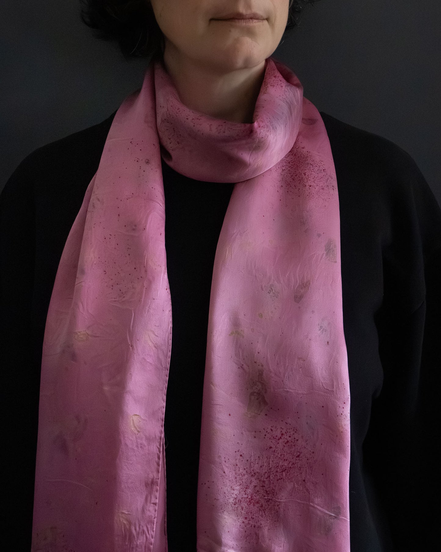long silk scarf worn loosely around the neck, natural dye