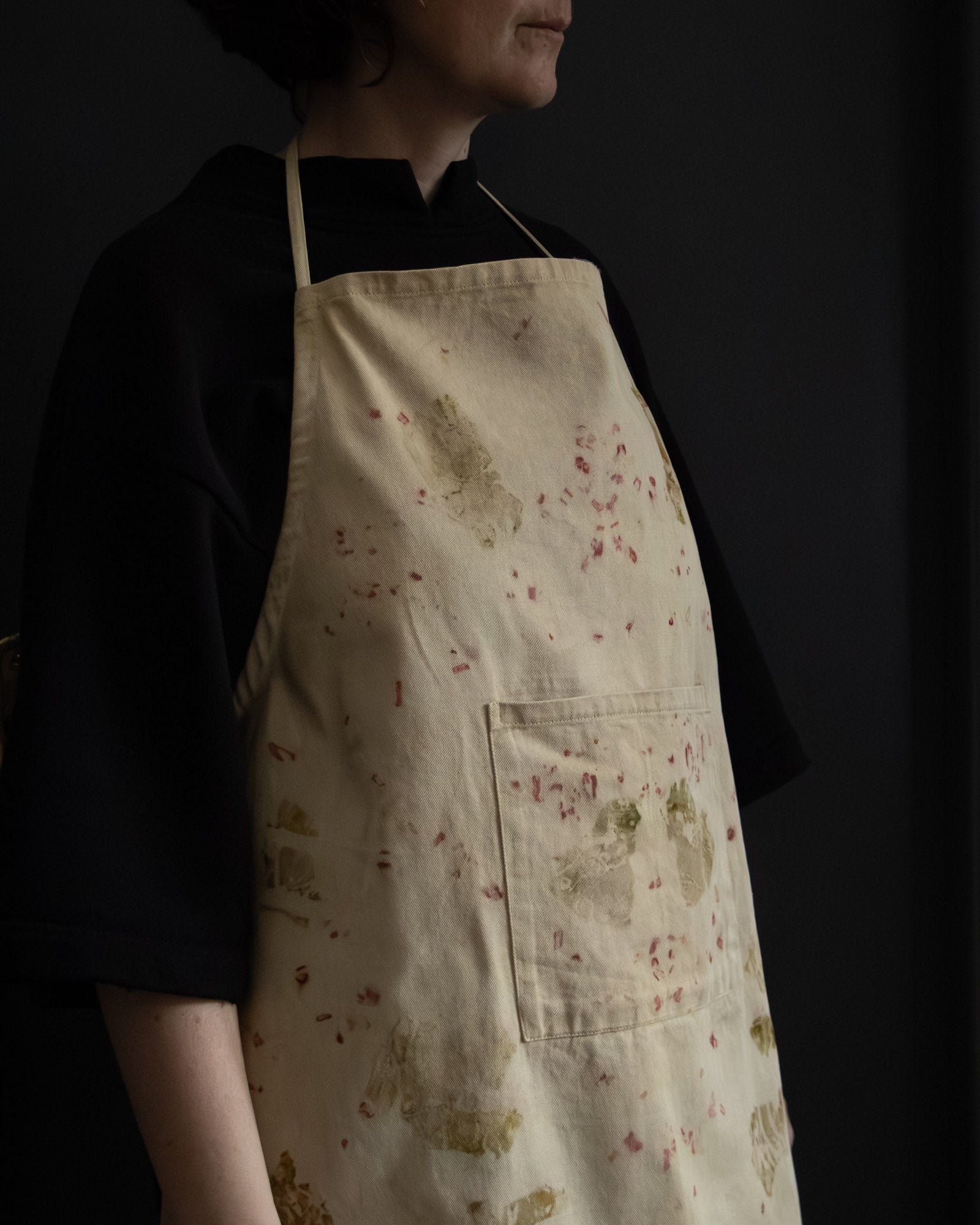 apron with natural dye patterns, close-up texture