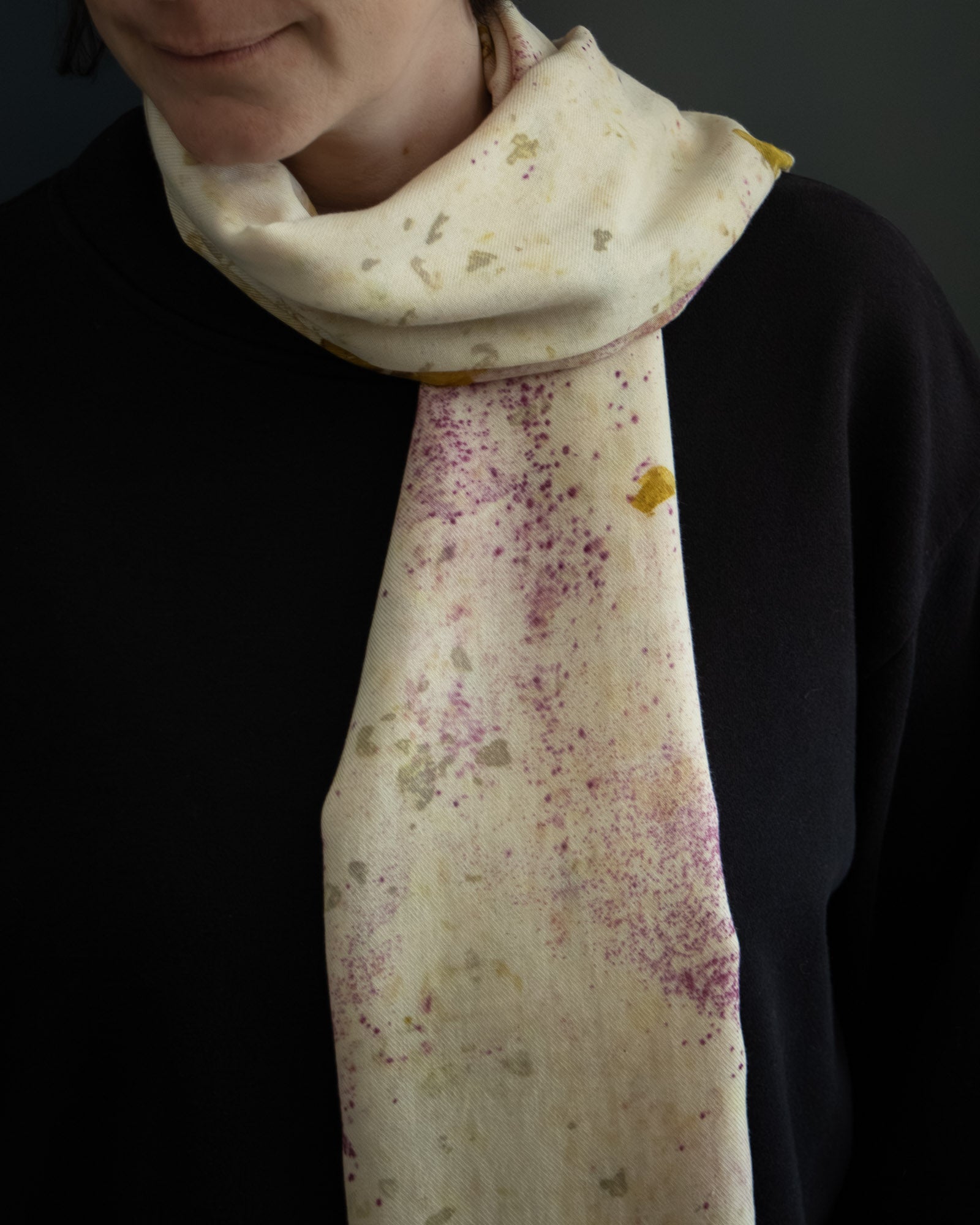 cotton scarf with natural dye patterns, worn front view